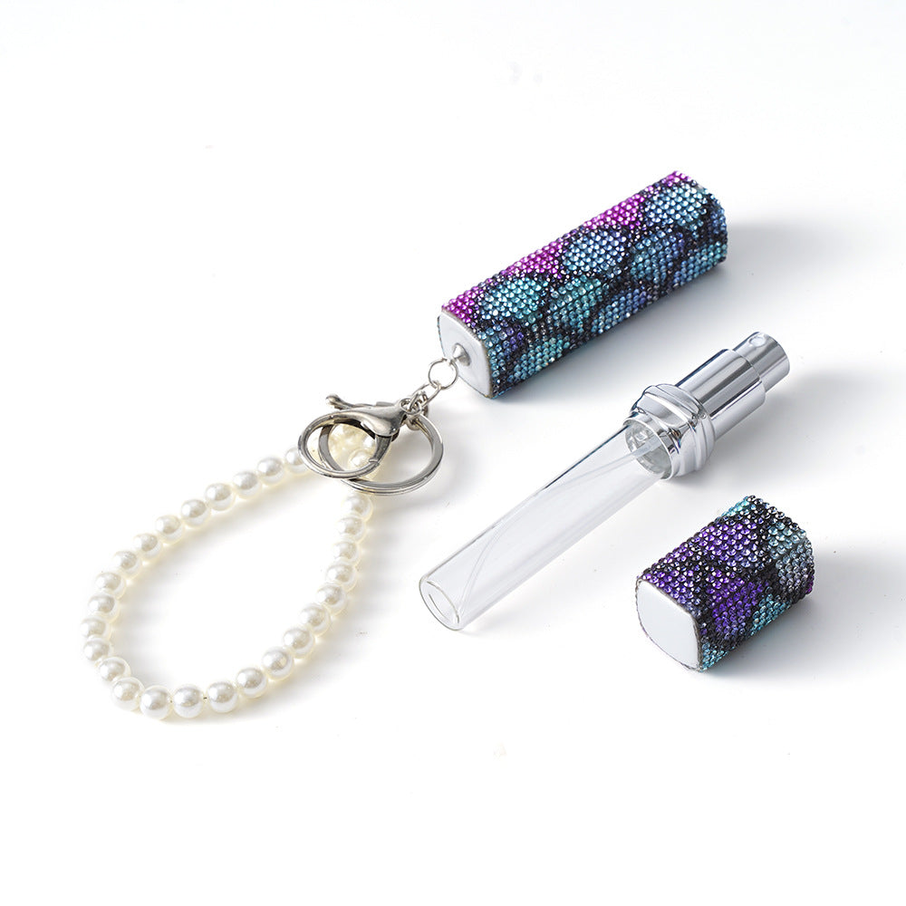 Wholesale Diamond-studded creative 10ml perfume bottle keychain